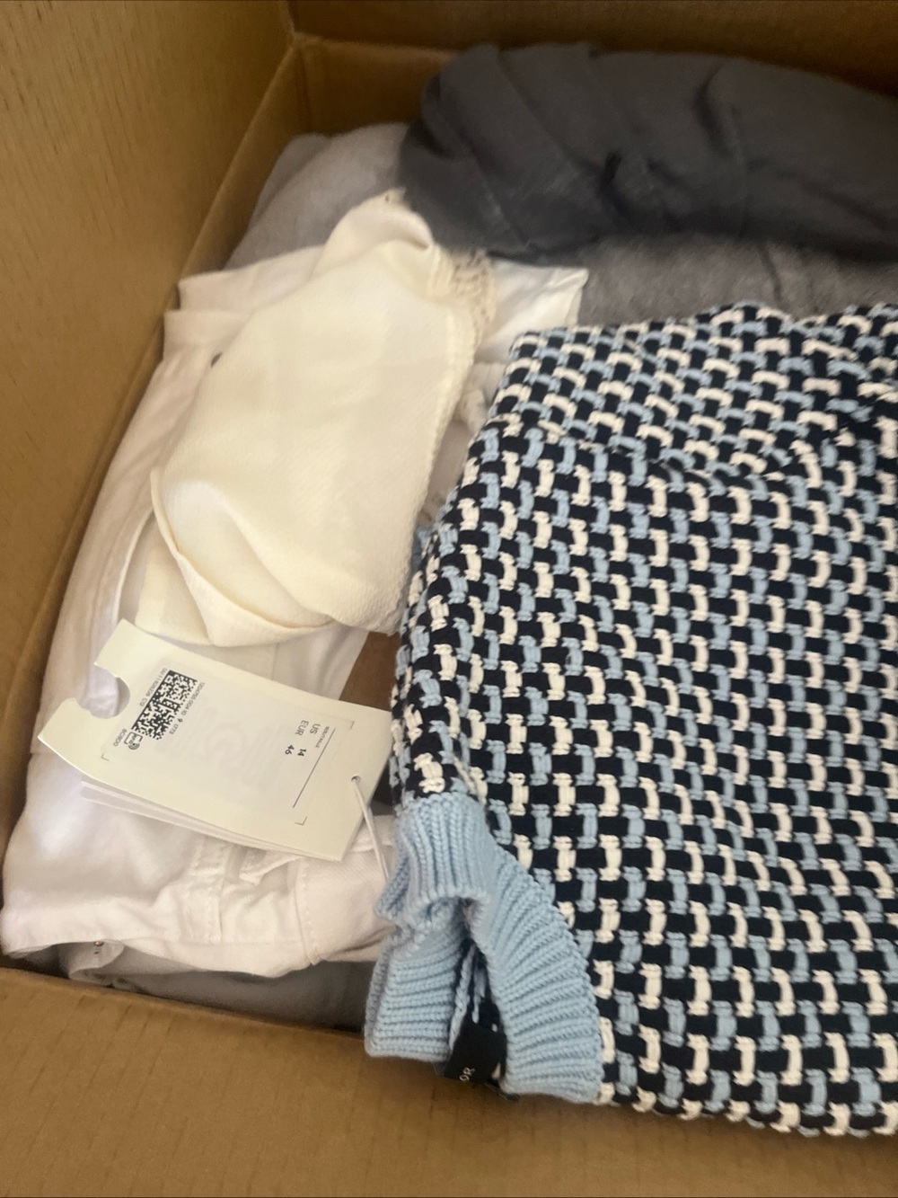 Assorted Bundle Box of Unopened Items
& Clothes